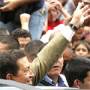 Venezuela's President Chavez waves to a crowd