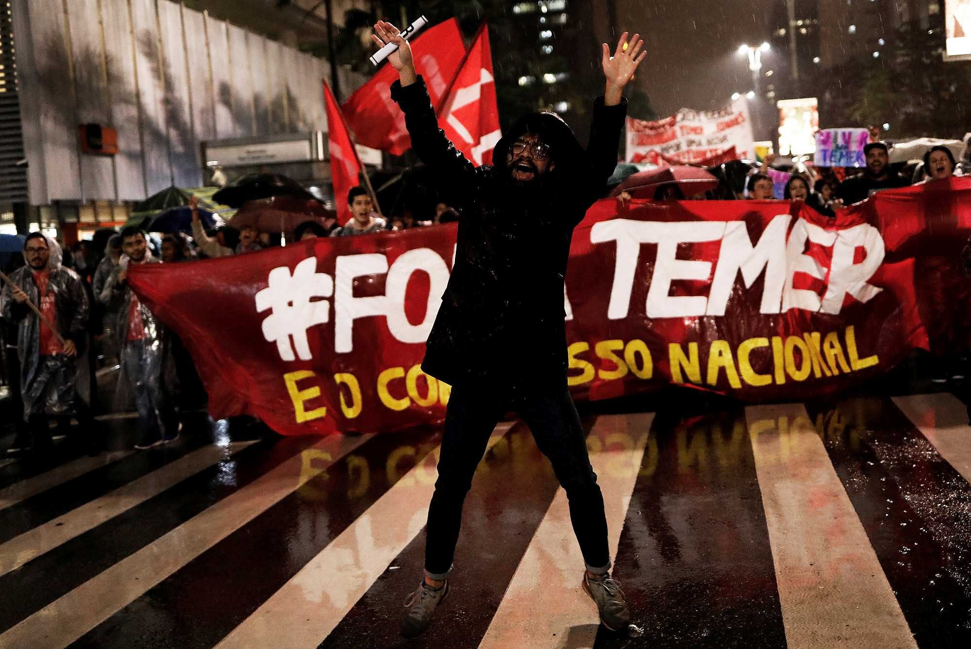 Protesters ask for the ousting of Brazilian president and congress