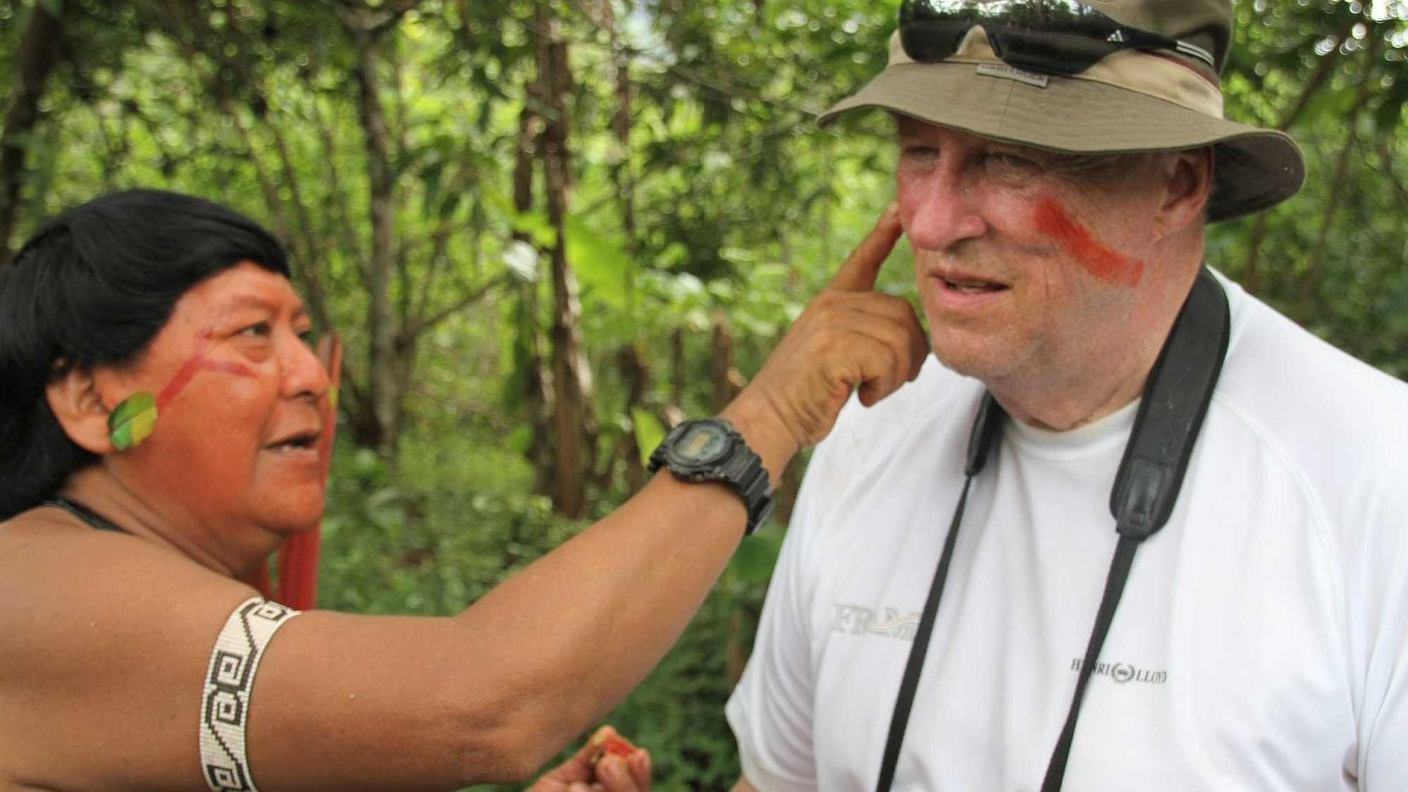 King Harald V of Norway with an indigenous group in Brazil. Photo courtesy of Rainforest Foundation Norway