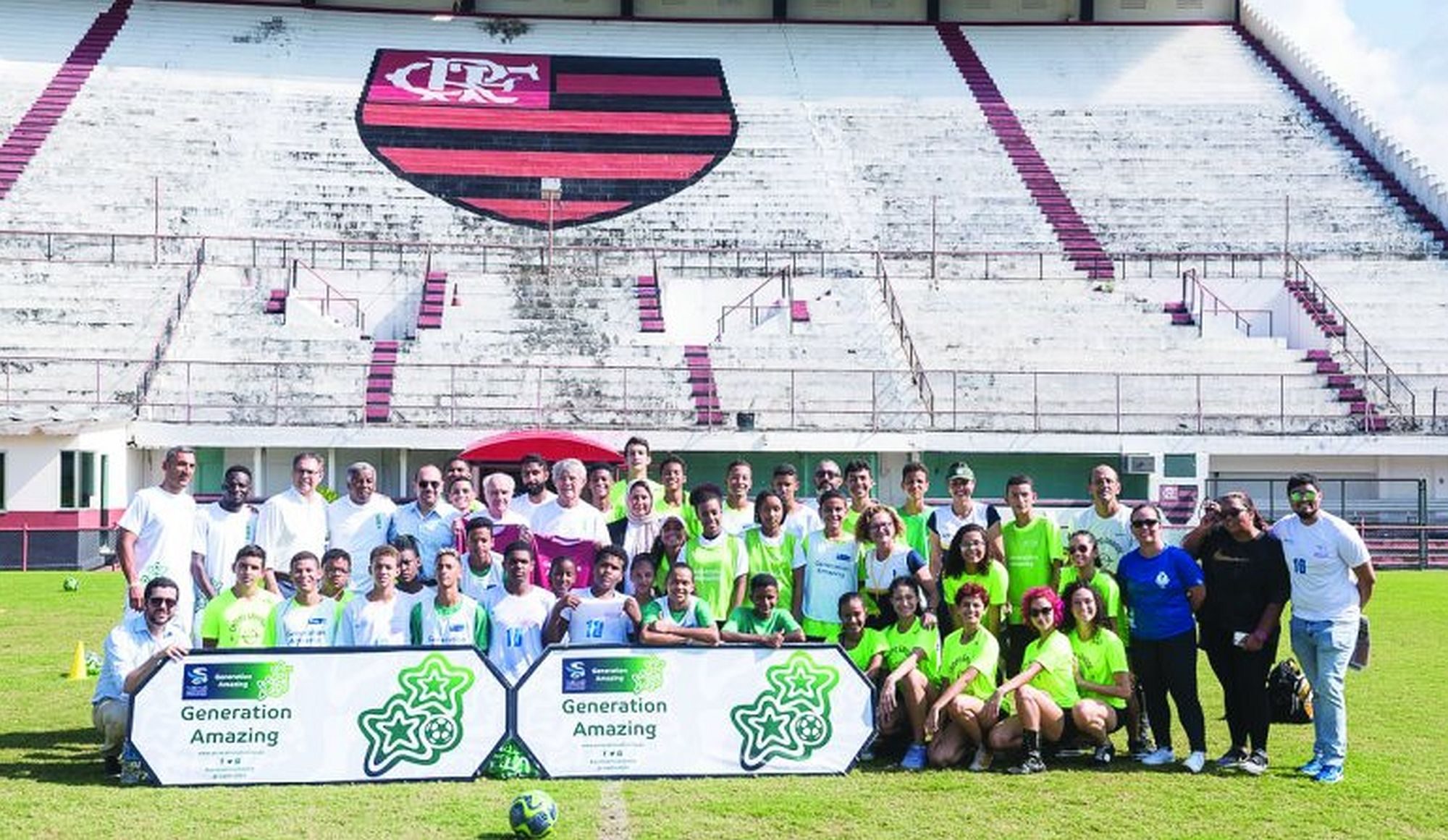 Generation Amazing, United Nations Office on Drugs and Crime and Flamengo FC officials with participants of soccer classes for poor kids in Rio.