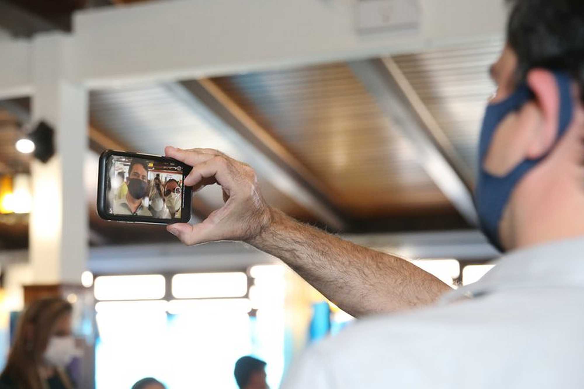 Former Minister of Justice and Public Security and Federal Judge, Sergio Moro taking a selfie during his vote in Municipal Elections 2020 in Curitiba, Brazil, on Sunday 15 November 2020. | Geraldo Bubniak/ZUMA Wire/PA Images