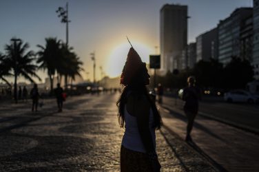 Silhouette of Indigenous leader Tereza Arapium in the famous Copacabana beach sidewalk. Image by Mongabay