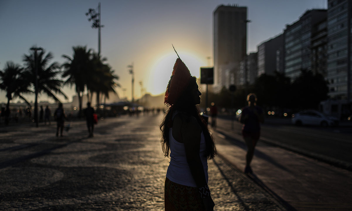 Silhouette of Indigenous leader Tereza Arapium in the famous Copacabana beach sidewalk. Image by Mongabay