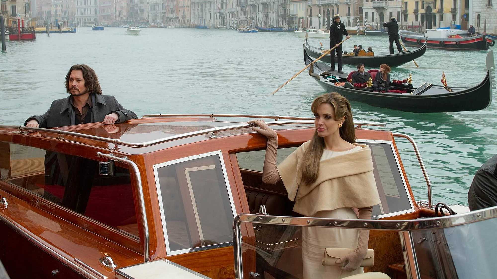 Angelina Jolie in a boat in a Venice canal in the movie The Tourist, in Venice