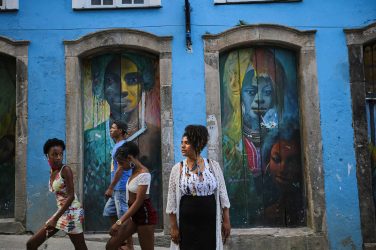 Rutian Pataxó, poses at historic center of Salvador, capital of Bahia state. Image by Raul Spinassé