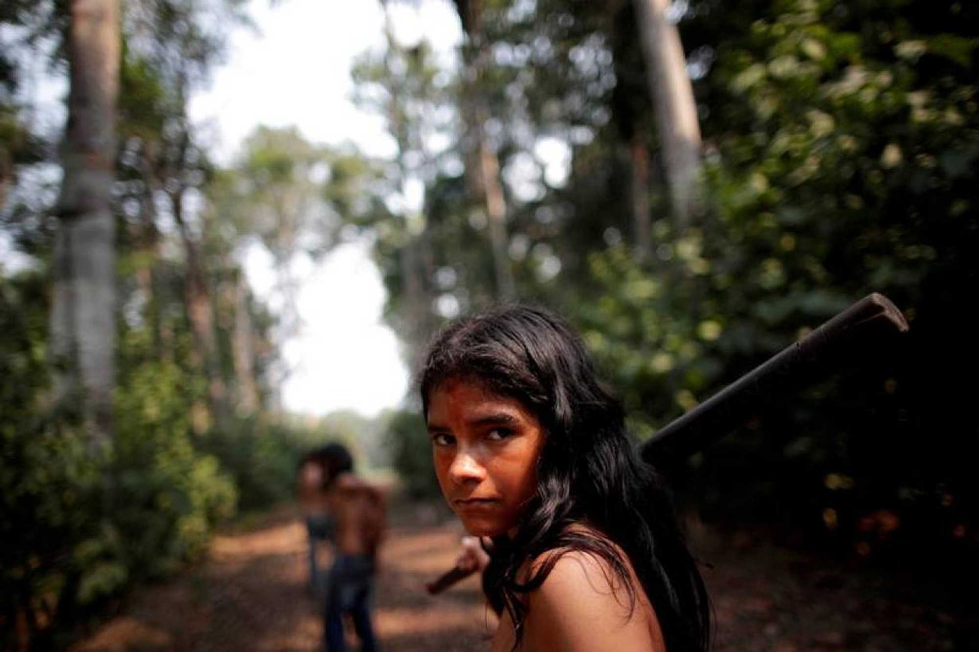 Pedro Mura, from the Mura tribe, reacts in front of a deforested area inside the Amazon rainforest - REUTERS/Ueslei Marcelino
