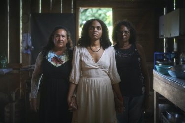 Dani Silva, center, alongside Francineide Ferreira dos Santos and Raimunda Gomes da Silva. All three were expelled from their land. | Pablo Albarenga