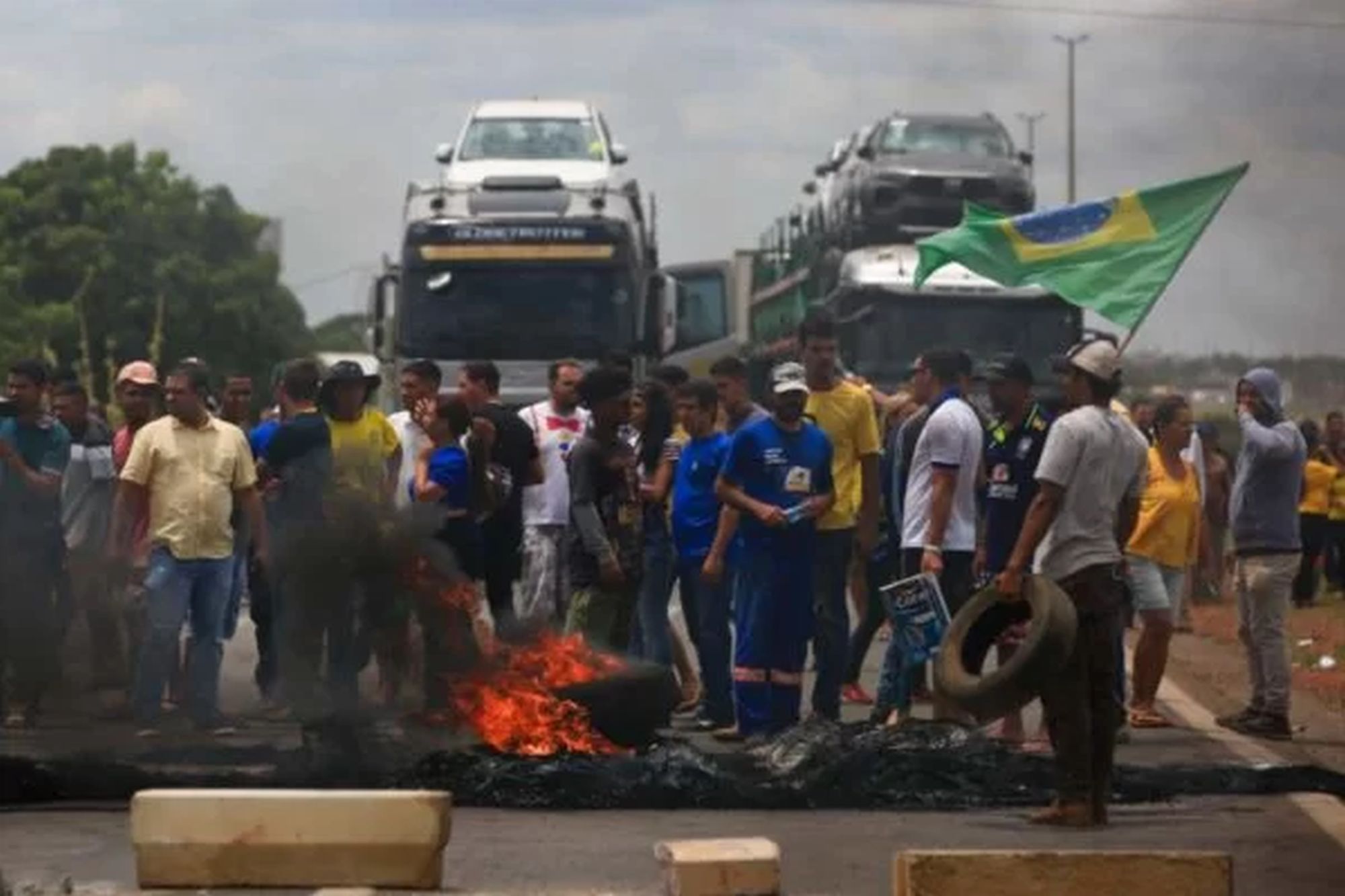 Truck drivers block a highway during a protest over Bolsonaro's defeat