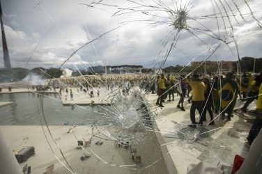 Supporters of former President Jair Bolsonaro clash with security forces. Joedson Alves/Anadolu Agency via Getty Images