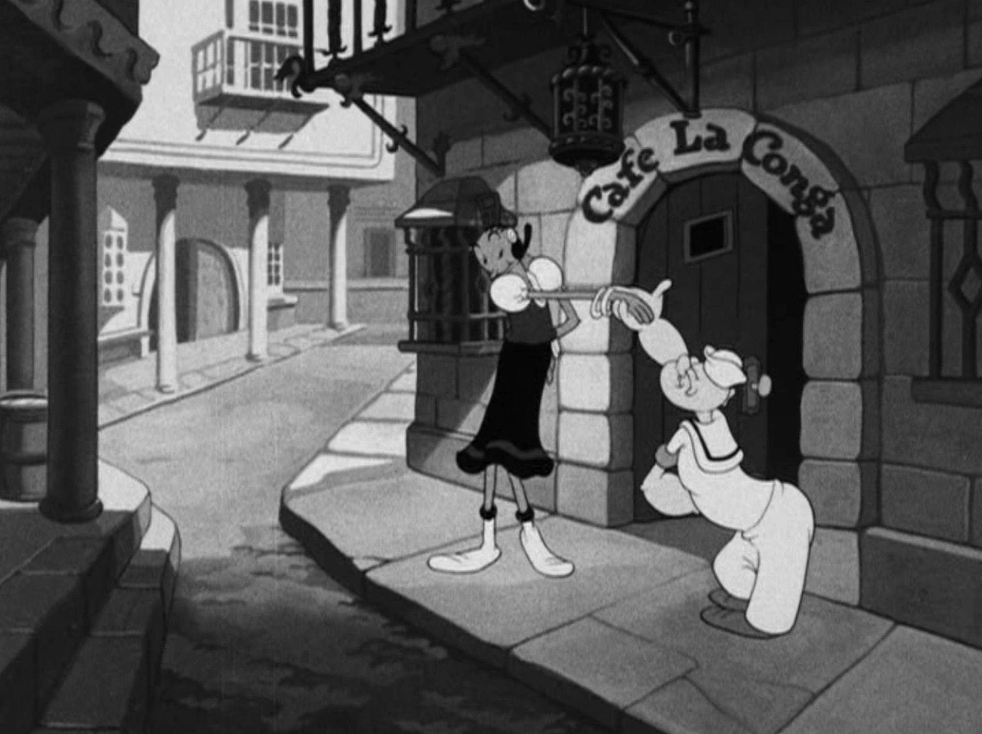Popeye (right) escorts Miss Olivia Oyla to the Cafe La Conga in “Kickin’ the Conga Round” (1942)