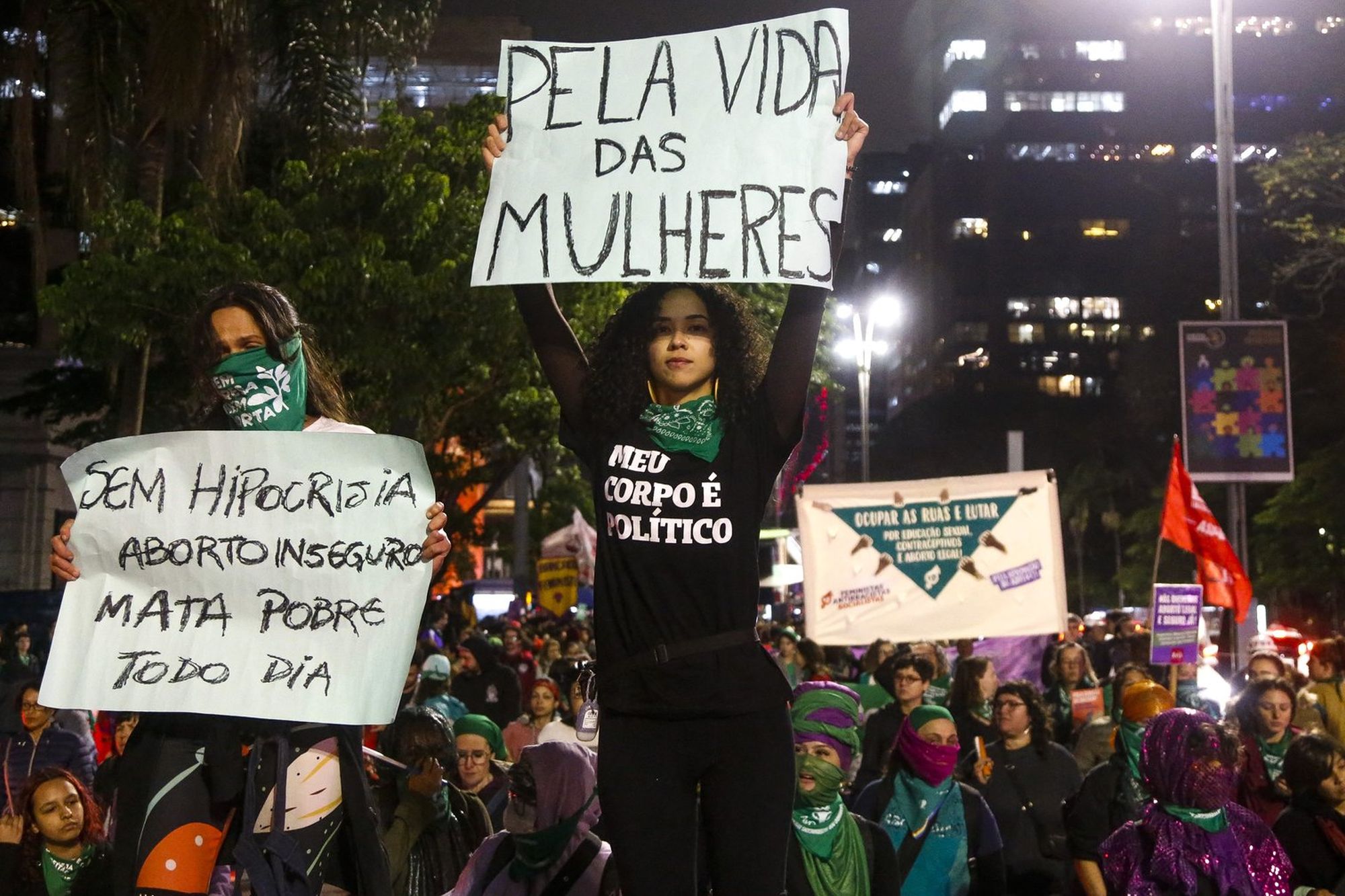 ‘No hypocrisy - unsafe abortion kills the poor every day’ and ‘For women’s lives’. Signs held in support of legal abortion during a march in São Paulo | MIGUEL SCHINCARIOL/AFP via Getty Images